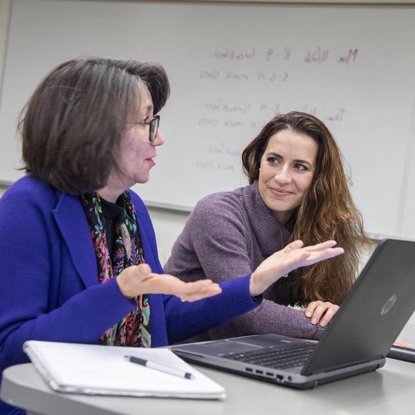 Health communication graduate program professor teaching a class.